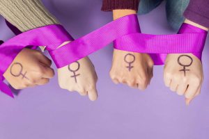 close-up-women-hands-with-feminism-symbol (1)_11zon