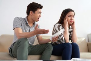 medium-shot-asian-man-shouting-his-wife-holding-piece-paper (1)